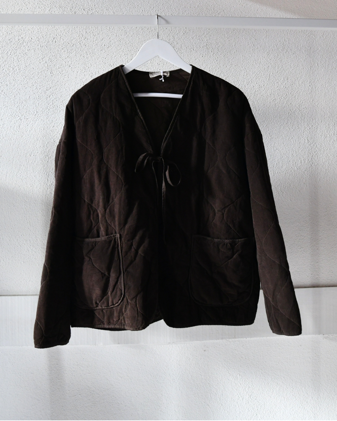 Steppjacke mit Schleife